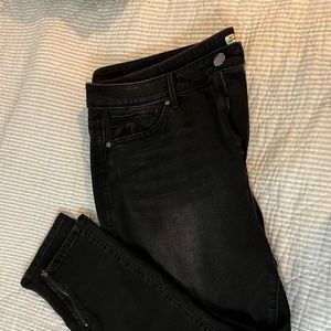 Black skinny jeans with zipper ankles. Super cute!